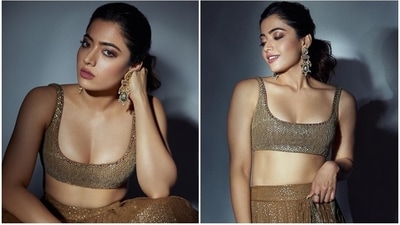 Rashmika Mandanna has been busy with the promotions of her upcoming film Goodbye, and amid the busy schedule, the star is also making sartorial statements with her impeccable fashion picks. Rashmika's most recent promotional photoshoot in a golden lehenga choli set backs our statement. The star recently dropped pictures of herself in the shimmery ensemble and garnered love from her fans online. (Instagram) Rashmika Mandanna has been busy with the promotions of her upcoming film Goodbye, and amid the busy schedule, the star is also making sartorial statements with her impeccable fashion picks. Rashmika's most recent promotional photoshoot in a golden lehenga choli set backs our statement. The star recently dropped pictures of herself in the shimmery ensemble and garnered love from her fans online. (Instagram)
