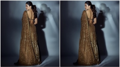 Coming to the design details of Rashmika's outfit, the sleeveless choli features a plunging wide U neckline and back, shimmering sequin embellishments, and a cropped midriff-revealing hem length. (Instagram) Coming to the design details of Rashmika's outfit, the sleeveless choli features a plunging wide U neckline and back, shimmering sequin embellishments, and a cropped midriff-revealing hem length. (Instagram)