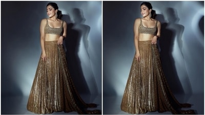 Rashmika wore the blouse with a matching lehenga decked with heavy sequin embellishments, several pleats falling from the waistband to form an A-line silhouette, heavily layered ghera, and a floor-grazing hem length. (Instagram) Rashmika wore the blouse with a matching lehenga decked with heavy sequin embellishments, several pleats falling from the waistband to form an A-line silhouette, heavily layered ghera, and a floor-grazing hem length. (Instagram)