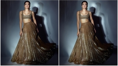 Rashmika's lehenga choli set is from the shelves of designer Sawan Gandhi's eponymous clothing label. Celebrity stylist Lakshmi Lehr styled Rashmika in the shimmering ensemble - a perfect pick for the modern Indian woman. (Instagram) Rashmika's lehenga choli set is from the shelves of designer Sawan Gandhi's eponymous clothing label. Celebrity stylist Lakshmi Lehr styled Rashmika in the shimmering ensemble - a perfect pick for the modern Indian woman. (Instagram)