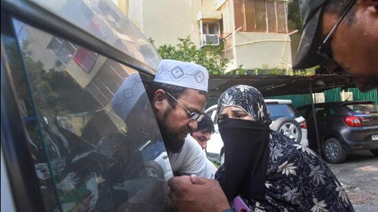Aneesh, an accused detained during a raid by Special Cell of the Delhi Police for his alleged association with Popular Front of India (PFI), at Amar Colony police station, in New Delhi, Tuesday. (PTI)