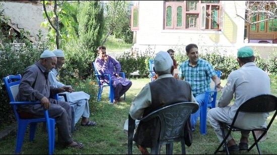 Altaf Bukhari supporters at his house in Uri. (HT Photo)