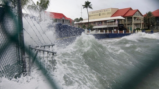 Hurricane Ian: Waves crash against a seawall as Hurricane Ian passes.(AP)