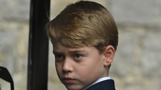 Prince George: Prince George of Wales is seen arriving at St George's Chapel.(Reuters)