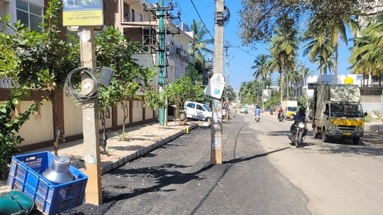 Electric poles in the middle of the road.&nbsp;