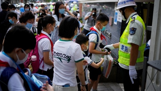 Video: Rare protest in China city locked down over 10 Covid cases ...