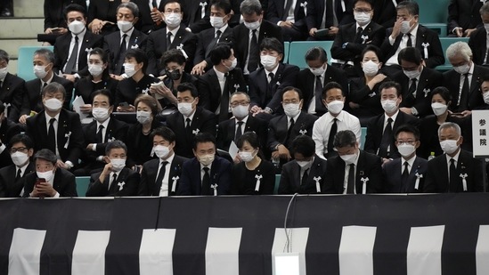 Attendants arrive at the state funeral of assassinated former Prime Minister of Japan Shinzo Abe.(AP)