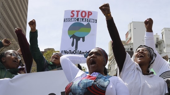 Environmental activists take part in a protest calling for the government to take immediate action against climate change in Cape Town, South Africa, Saturday, September 24.&nbsp;(AP)