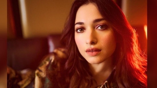Tamannaah Bhatia styled her look with a pair of silver hoop earrings and rings from the jewellery line Misho Designs.(Instagram/@tamannaahspeaks)