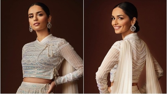 Manushi Chhillar's earlier set of Instagram photos featured the model in a stunning ivory contemporary lehenga set by Siwangi Pradhan.(Instagram/@manushi_chhillar)