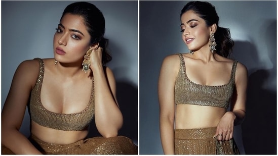 Rashmika Mandanna has been busy with the promotions of her upcoming film Goodbye, and amid the busy schedule, the star is also making sartorial statements with her impeccable fashion picks. Rashmika's most recent promotional photoshoot in a golden lehenga choli set backs our statement. The star recently dropped pictures of herself in the shimmery ensemble and garnered love from her fans online.(Instagram)