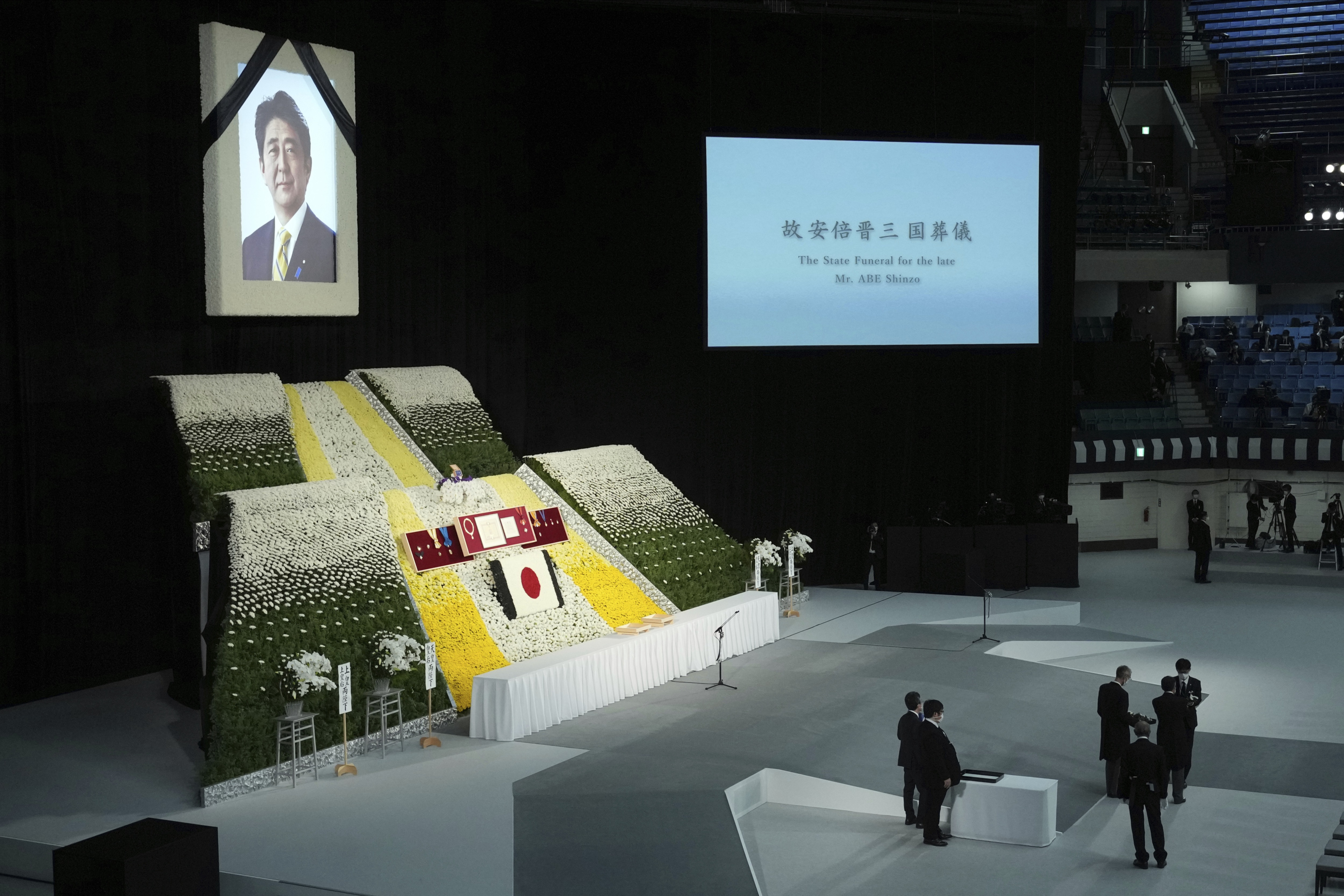 Shinzo Abe State Funeral: Staff prepare before the start of the state funeral of assassinated former Prime Minister of Japan Shinzo Abe. (AP) Shinzo Abe State Funeral: Staff prepare before the start of the state funeral of assassinated former Prime Minister of Japan Shinzo Abe. (AP)