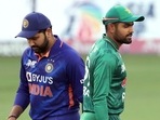 Rohit Sharma (L) with Babar Azam(ANI) Rohit Sharma (L) with Babar Azam(ANI)