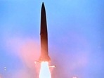 People watch a television screen showing a news broadcast with file footage of a North Korean missile test, at a railway station in Seoul. People watch a television screen showing a news broadcast with file footage of a North Korean missile test, at a railway station in Seoul.
