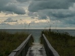 Hurricane Ian In Florida: Clouds loom over a walkway to St. Pete Beach ahead of Hurricane Ian. Hurricane Ian In Florida: Clouds loom over a walkway to St. Pete Beach ahead of Hurricane Ian.