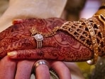 In the presence of his first wife, Kalyan married Nithya Sree on Wednesday at a local temple.(Unsplash/MARCUS LEWIS.) In the presence of his first wife, Kalyan married Nithya Sree on Wednesday at a local temple.(Unsplash/MARCUS LEWIS.)