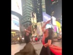 A screengrab from the video that shows the two women doing Garba at Times Square. (Instagram/@_misthel) A screengrab from the video that shows the two women doing Garba at Times Square. (Instagram/@_misthel)