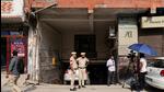 Media and policemen stand outside the office of Popular Front of India (PFI) group in New Delhi on Wednesday. (Reuters) Media and policemen stand outside the office of Popular Front of India (PFI) group in New Delhi on Wednesday. (Reuters)