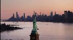 NEW YORK, NEW YORK - MARCH 18: Dawn breaks over The Statue of Liberty as Manhattan and the nation struggles to contain the number of coronavirus cases on March 18, 2020 in New York City. Across the city businesses, schools and places of work have been shutting down leading to empty streets and quiet neighborhoods. New York City mayor Bill de Blasio has threatened to call for a 'shelter-in-place' order as Manhattan continues to see a rise in cases of the virus. World wide, 200,000 people have now contracted COVID-19. Spencer Platt/Getty Images/AFP == FOR NEWSPAPERS, INTERNET, TELCOS & TELEVISION USE ONLY == (AFP) NEW YORK, NEW YORK - MARCH 18: Dawn breaks over The Statue of Liberty as Manhattan and the nation struggles to contain the number of coronavirus cases on March 18, 2020 in New York City. Across the city businesses, schools and places of work have been shutting down leading to empty streets and quiet neighborhoods. New York City mayor Bill de Blasio has threatened to call for a 'shelter-in-place' order as Manhattan continues to see a rise in cases of the virus. World wide, 200,000 people have now contracted COVID-19. Spencer Platt/Getty Images/AFP == FOR NEWSPAPERS, INTERNET, TELCOS & TELEVISION USE ONLY == (AFP)