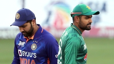 Rohit Sharma (L) with Babar Azam (ANI) Rohit Sharma (L) with Babar Azam (ANI)