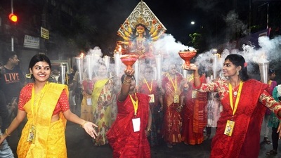 The iconic Dhunuchi Naach is an integral part of Durga Puja and has become synonymous with the festival. It is performed during the evening Durga aarti by devotees holding two or even three dhunuchis at once and dancing to the beats of the Dhak. Here's all you need to know about the significance of Bengal's Dhunuchi Naach during Durga Puja. (ANI) The iconic Dhunuchi Naach is an integral part of Durga Puja and has become synonymous with the festival. It is performed during the evening Durga aarti by devotees holding two or even three dhunuchis at once and dancing to the beats of the Dhak. Here's all you need to know about the significance of Bengal's Dhunuchi Naach during Durga Puja. (ANI)