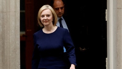 UK Inflation: Britain's Prime Minister Liz Truss walks outside Downing Street in London, Britain. (Reuters)