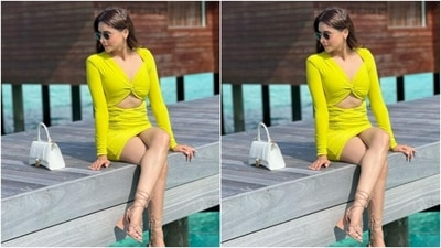 Aamna’s neon green dress featured a plunging sweetheart neckline, full sleeves and a midriff-baring detail. The bodycon dress with ruched details, hugged her shape and showed off her corves. (Instagram/@aamnasharifofficial) Aamna’s neon green dress featured a plunging sweetheart neckline, full sleeves and a midriff-baring detail. The bodycon dress with ruched details, hugged her shape and showed off her corves. (Instagram/@aamnasharifofficial)