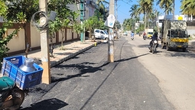 Electric poles in the middle of the road.&nbsp;
