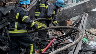 Russia-Ukraine War: Firefighters work to extinguish a fire which erupted at a depot of the freight railway station in Kharkiv. (AFP)