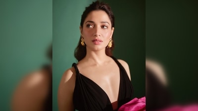 Tamannah Bhatia elevated her chic and glamorous look by teaming her gown with black stilettoes from the luxury line of Christian Louboutin. (Instagram/@tamannaahbhatia) Tamannah Bhatia elevated her chic and glamorous look by teaming her gown with black stilettoes from the luxury line of Christian Louboutin. (Instagram/@tamannaahbhatia)