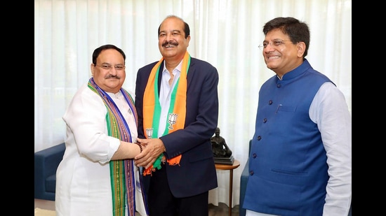 Himachal Pradesh Congress Committee working president Harsh Mahajan meets BJP national president JP Nadda after joining the Bharatiya Janata Party as Union minister Piyush Goyal looks on at party headquarters in New Delhi on Wednesday. (ANI)