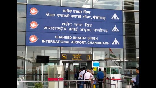 The new board put up at the departure gate of the Shaheed Bhagat Singh International Airport, Chandigarh, after the renaming ceremony on Wednesday. (Keshav Singh/HT)