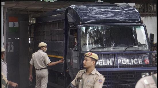 PFI members being produced in a court in New Delhi. (PTI)