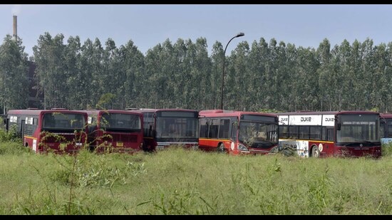 City bus service buses parked at city bus depot at Tajpur road in Ludhiana. In July, MC commissioner Shena Aggarwal had formed a committee to check whether these buses can be made operational or if they have to be sold. (Gurpreet Singh/HT)