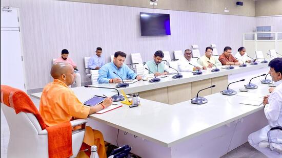 Uttar Pradesh chief minister Yogi Adityanath at a meeting with ministers of state in Lucknow on Wednesday. (SOURCED)