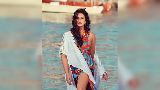 Huma Qureshi recently dropped a series of images on her Instagram handle where she can be seen wearing a multi-coloured printed maxi dress.(Instagram/@iamhumaq)