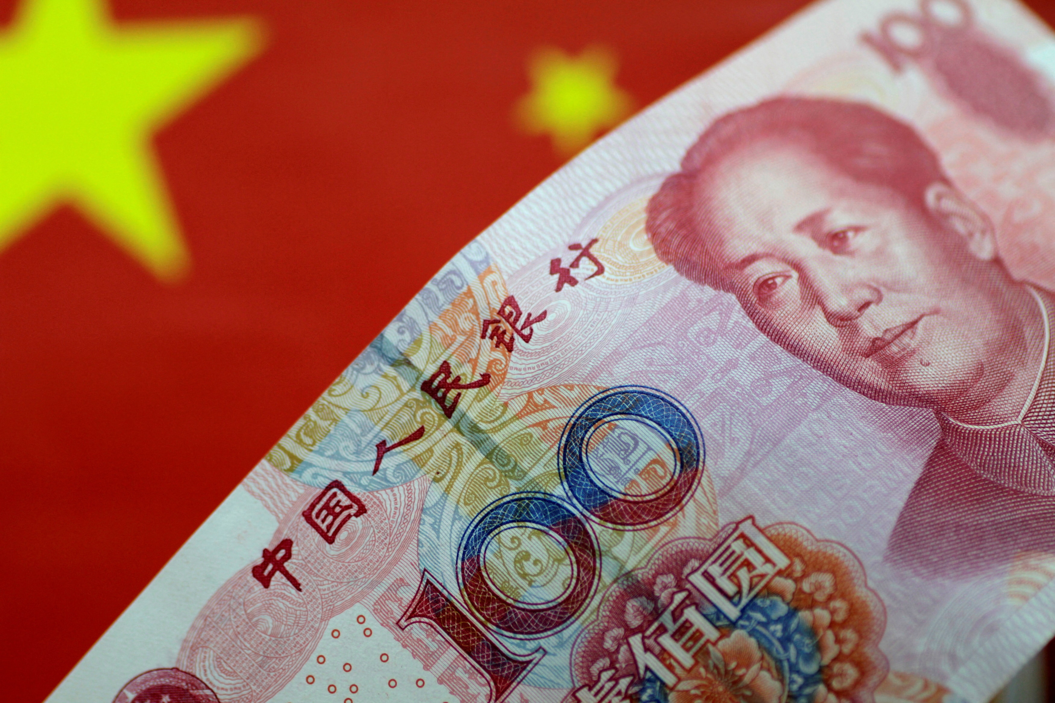 The yuan fell to 7.2301 to the dollar, its lowest level since January 2008. (REUTERS)