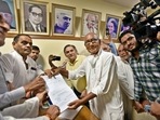 Senior Congress leader Digvijaya Singh collects the nomination form for the post of party president, at AICC headquarters in New Delhi on Thursday. (Sanjeev Verma/HT) Senior Congress leader Digvijaya Singh collects the nomination form for the post of party president, at AICC headquarters in New Delhi on Thursday. (Sanjeev Verma/HT)
