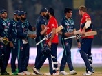 England's Moeen Ali, third right, and David Walley, right, shake hand with Pakistani players on the end of the fifth T20I.