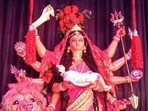 Durga Puja pandal in Kolkata by BJP leader Biswajit Sarkar depicts Bengal's post-poll violence with the Goddess shown as the mother of a dead child.(Twitter) Durga Puja pandal in Kolkata by BJP leader Biswajit Sarkar depicts Bengal's post-poll violence with the Goddess shown as the mother of a dead child.(Twitter)