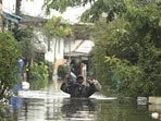 Thailand Rainfall: A resident wades through floodwaters in Ubon Ratchathani province, northeastern Thailand. (AP) Thailand Rainfall: A resident wades through floodwaters in Ubon Ratchathani province, northeastern Thailand. (AP)