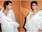 Hina Khan poses in a white ruffled saree with a sleeve. (Instagram) Hina Khan poses in a white ruffled saree with a sleeve. (Instagram)