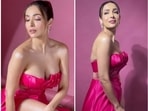 Malaika Arora poses for a photoshoot in a strapless hot pink gown. Malaika Arora poses for a photoshoot in a strapless hot pink gown. 