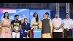 Prime Minister Narendra Modi with PV Sindhu, Neeraj Chopra and others during inauguration of 36th National Games in Ahmedabad, Thursday (PIB) Prime Minister Narendra Modi with PV Sindhu, Neeraj Chopra and others during inauguration of 36th National Games in Ahmedabad, Thursday (PIB)
