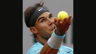 Spain's Rafael Nadal serves to Robby Ginepri of the U.S. during the first round match of the French Open tennis tournament at the Roland Garros stadium, in Paris(AP Photo/Michel Spingler) Spain's Rafael Nadal serves to Robby Ginepri of the U.S. during the first round match of the French Open tennis tournament at the Roland Garros stadium, in Paris(AP Photo/Michel Spingler)