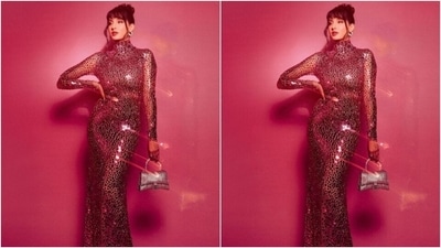 Nora wore her tresses into a messy bun and left a few strands of hair open around her face as she posed for the fashion photoshoot. (Instagram/@notafatehi) Nora wore her tresses into a messy bun and left a few strands of hair open around her face as she posed for the fashion photoshoot. (Instagram/@notafatehi)