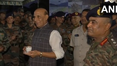 The image, taken from the Twitter video, shows army jawans singing Sandese Aate Hai in front of defence minister Rajnath Singh. (Twitter/@ANI)
