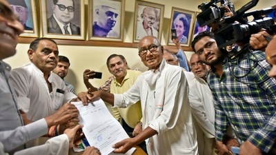Senior Congress leader Digvijaya Singh collects the nomination form for the post of party president, at AICC headquarters in New Delhi on Thursday. (Sanjeev Verma/HT) Senior Congress leader Digvijaya Singh collects the nomination form for the post of party president, at AICC headquarters in New Delhi on Thursday. (Sanjeev Verma/HT)