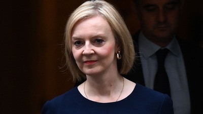 UK's Liz Truss On Economic Plan: Britain's Prime Minister Liz Truss walks out of Number 10 Downing Street. (AFP) UK's Liz Truss On Economic Plan: Britain's Prime Minister Liz Truss walks out of Number 10 Downing Street. (AFP)