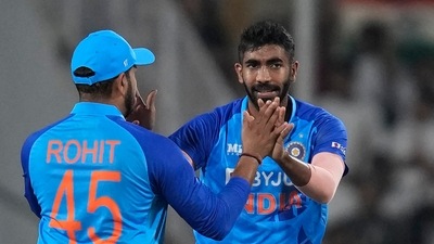 India's Jasprit Bumrah, right, celebrates with captain Rohit Sharma (AP) India's Jasprit Bumrah, right, celebrates with captain Rohit Sharma (AP)